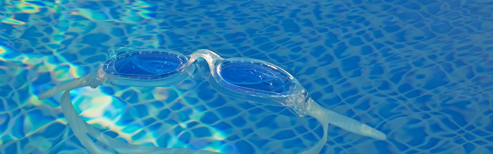 pool goggle floating in the water